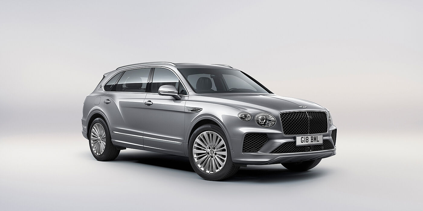 JCT600 Service Teeside Bentley Bentayga Extended Wheelbase luxury SUV front three quarter view in Moonbeam paint with 21 inch five spoke painted wheels
