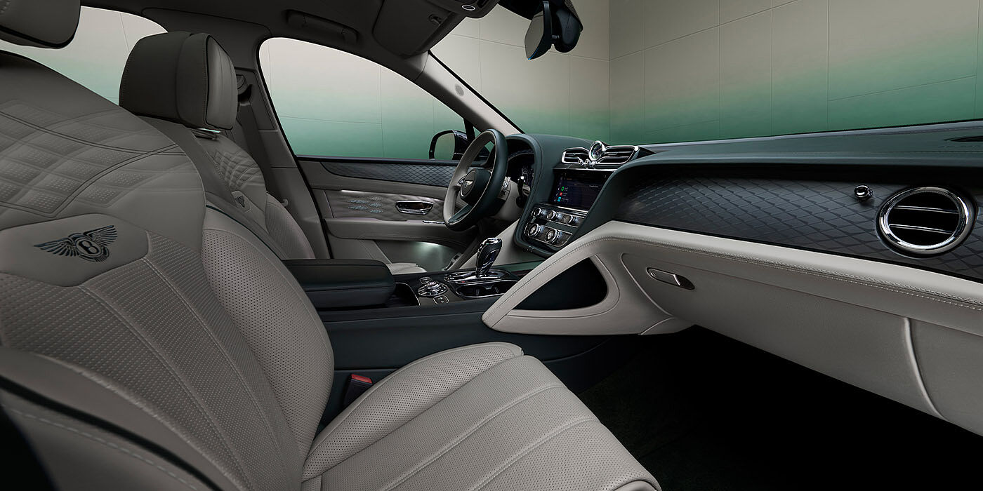 JCT600 Service Teeside Bentley Bentayga Extended Wheelbase Atelier Edition SUV front interior in Portland and Cumbrian Green hides with Dark Tint Diamond Brushed Aluminium veneer