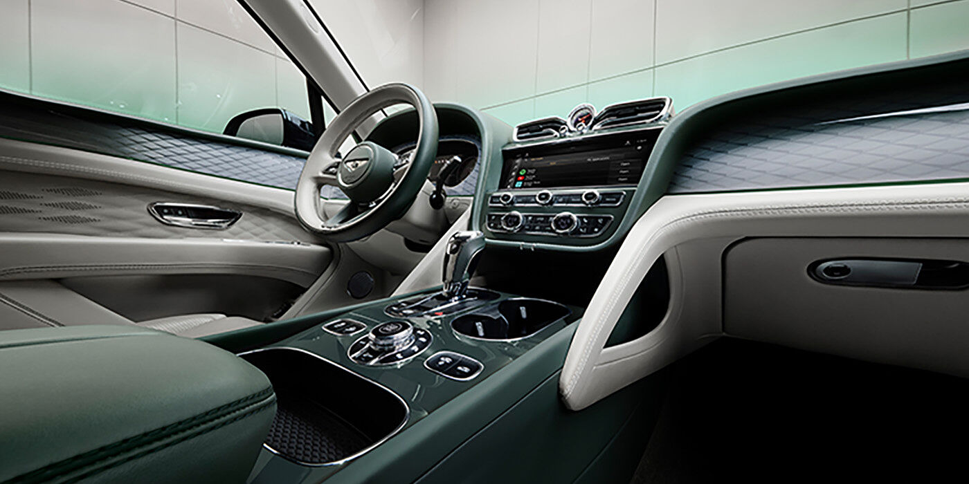 JCT600 Service Teeside Bentley Bentayga Atelier Edition SUV front interior in Portland and Cumbrian Green hides with Dark Tint Diamond Brushed Aluminium veneer