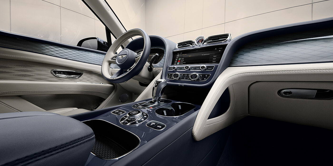 JCT600 Service Teeside Bentley Bentayga Atelier Edition SUV front interior in Linen and Imperial Blue hides with Dark Tint Diamond Brushed Aluminium veneer