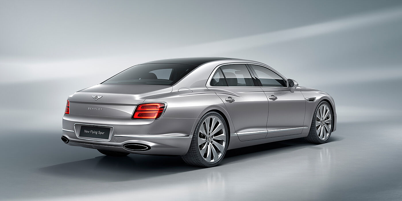 JCT600 Service Teeside New Bentley Flying Spur sedan rear view in Silverlake paint with ten spoke wheels and chrome matrix grille