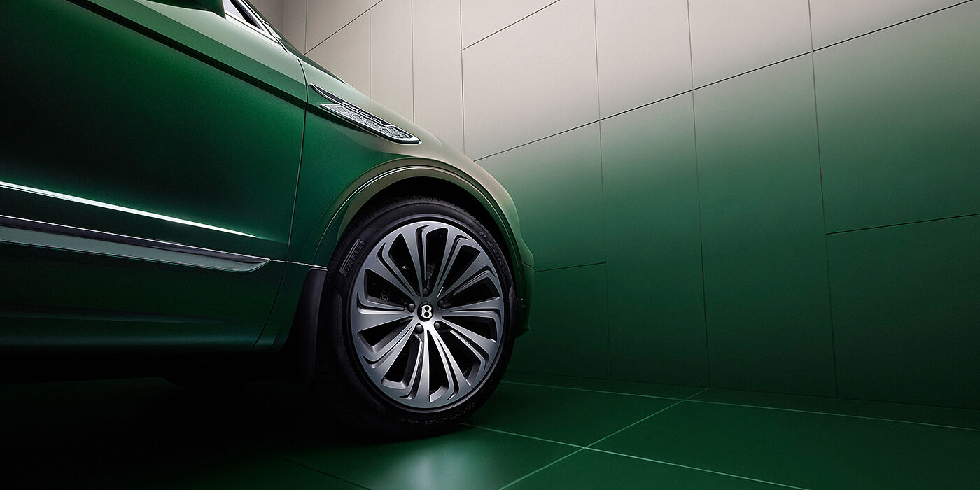 JCT600 Service Teeside Bentley Bentayga Extended Wheelbase Atelier Edition SUV in Light Emerald green paint front side detail with 22 inch 10 spoke wheel