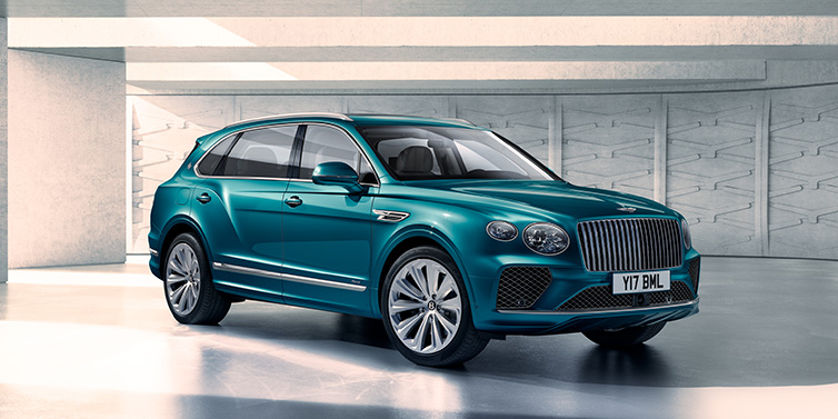 JCT600 Service Teeside Bentley Bentayga Extended Wheelbase Azure SUV front three quarter in Topaz blue paint colour with a grey background