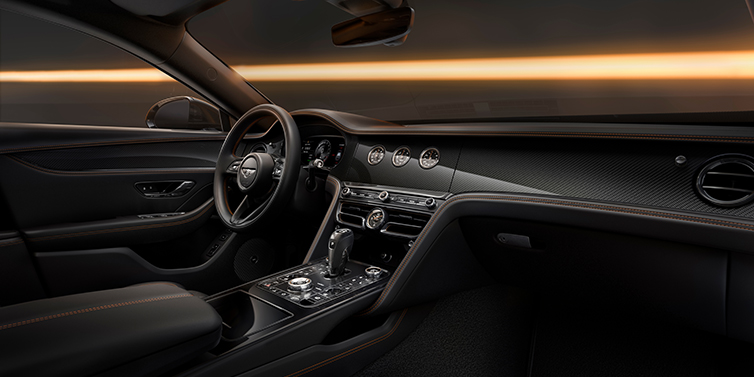 JCT600 Service Teeside Bentley Flying Spur Black Edition sedan front interior in Beluga black hide with High Gloss Carbon Fibre veneer
