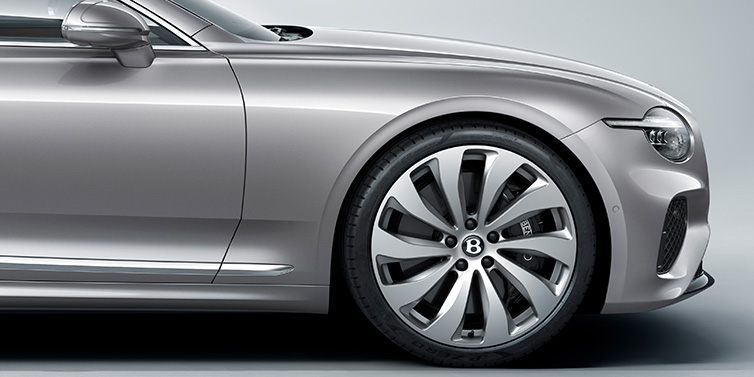 JCT600 Service Teeside New Bentley Continental GT coupe side view featuring bonnet in Silverlake paint and 22 inch ten spoke silver painted and bright machined wheel