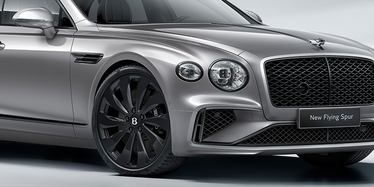 JCT600 Service Teeside New Bentley Flying Spur sedan front bonnet in Silverlake paint with Black Specification with black ten spoke wheel, black matrix grille and black exterior details