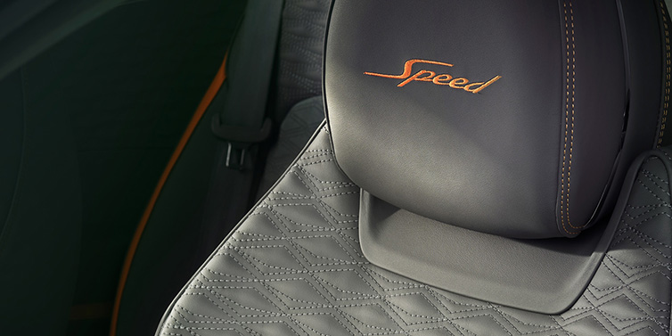 JCT600 Service Teeside Bentley Continental GT Speed coupe seat detail in Gravity Grey hide and Speed emblem in Mandarin by Mulliner coloured embroidery