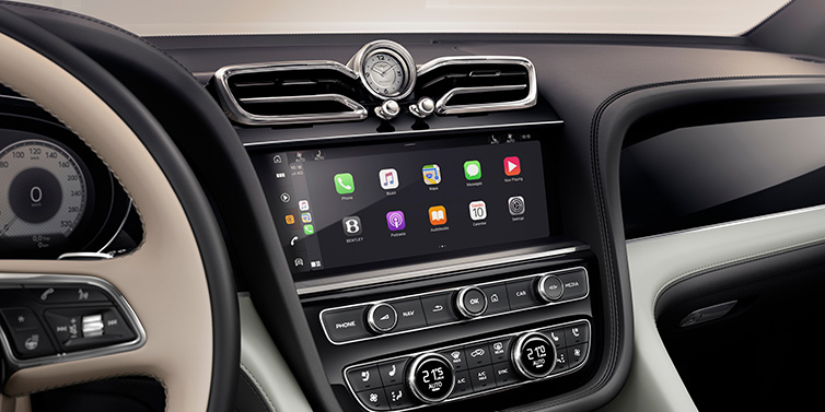 JCT600 Service Teeside Bentley Bentayga Extended Wheelbase Mulliner SUV front interior centre console with MMI screen showing Apps surrounded by Linen and Beluga black hide