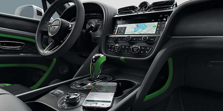 JCT600 Service Teeside Bentley Bentayga Speed SUV front cabin in Hyper Green and Beluga black hides, with Black Stained Crown Cut Walnut veneer