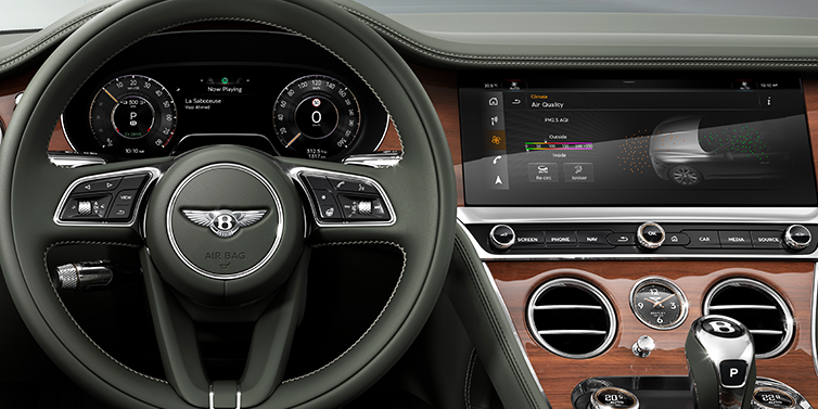JCT600 Service Teeside New Bentley Continental GTC convertible front interior steering wheel view, with Beluga black leather and Crown Cut walnut veneer