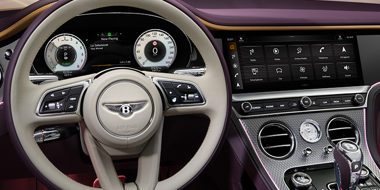 JCT600 Service Teeside Bentley Continental GTC Mulliner convertible steering wheel and drivers screens surrounded by Damson purple and Linen hides